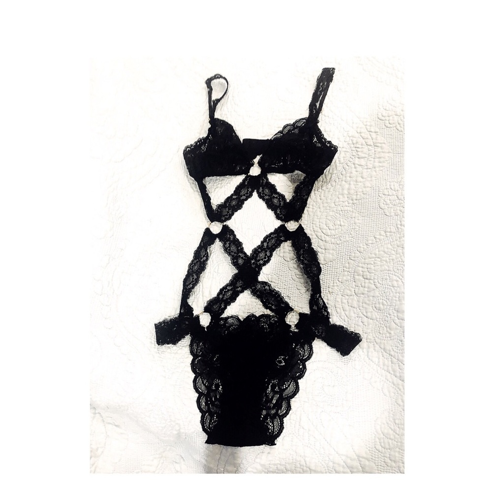 Black lace lingerie. Gold ring accents. NWT